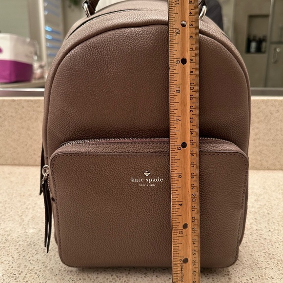 Authentic Kate Spade pebble leather backpack in tan. In excellent condition. - Picture 1 of 7